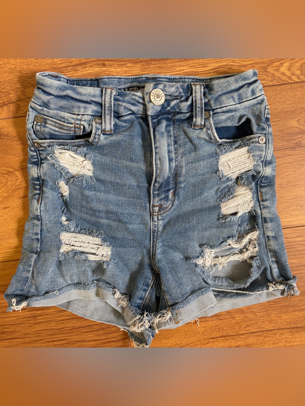 High- Waisted American Eagle Outfitters Distressed Light Blue Jean Shorts 0